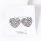 Clear-Rhodium-Crystal Stone Paved Heart Stud Earrings feature a sparkling design that adds a touch of elegance to any outfit. Crafted with expert precision and quality materials, these earrings are perfect for any occasion. The heart-shaped studs are encrusted with shimmering crystals, making them a stunning addition to any jewelry collection. 