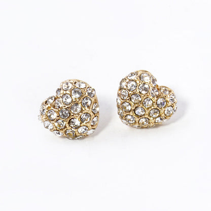 Crystal Paved Heart Stud Earrings bring elegance and sparkle to any outfit. Crafted with high-quality crystals, they are perfect for dressing up or adding a hint of glamour. The delicate heart design is a timeless classic that never goes out of style. 
