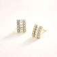 Madeline Love Clear, Gold 14K Gold Dipped Baguette CZ Cluster Stud Earrings - desc