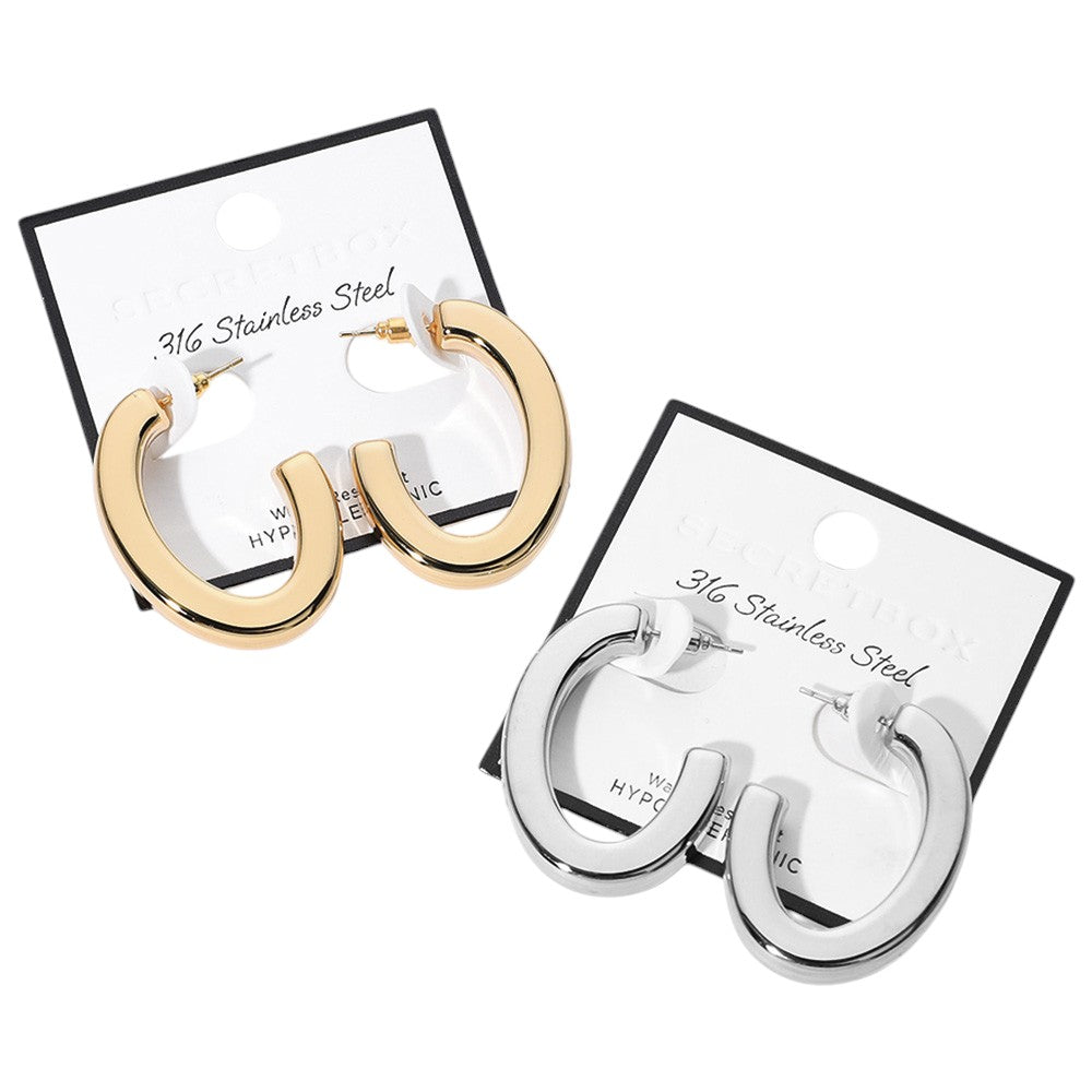 SECRET BOX_Stainless Steel Oval Hoop Earrings are crafted from hypoallergenic stainless steel, making them a safe and comfortable option for everyday wear. Sleek and stylish, their oval shape will add a touch of elegance to any outfit. Expertly designed for long-lasting durability.