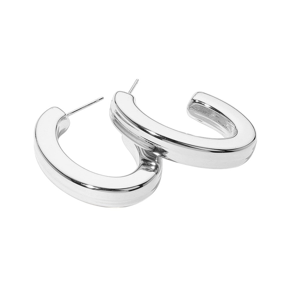 Rhodium SECRET BOX_Stainless Steel Oval Hoop Earrings are crafted from hypoallergenic stainless steel, making them a safe and comfortable option for everyday wear. Sleek and stylish, their oval shape will add a touch of elegance to any outfit. Expertly designed for long-lasting durability.