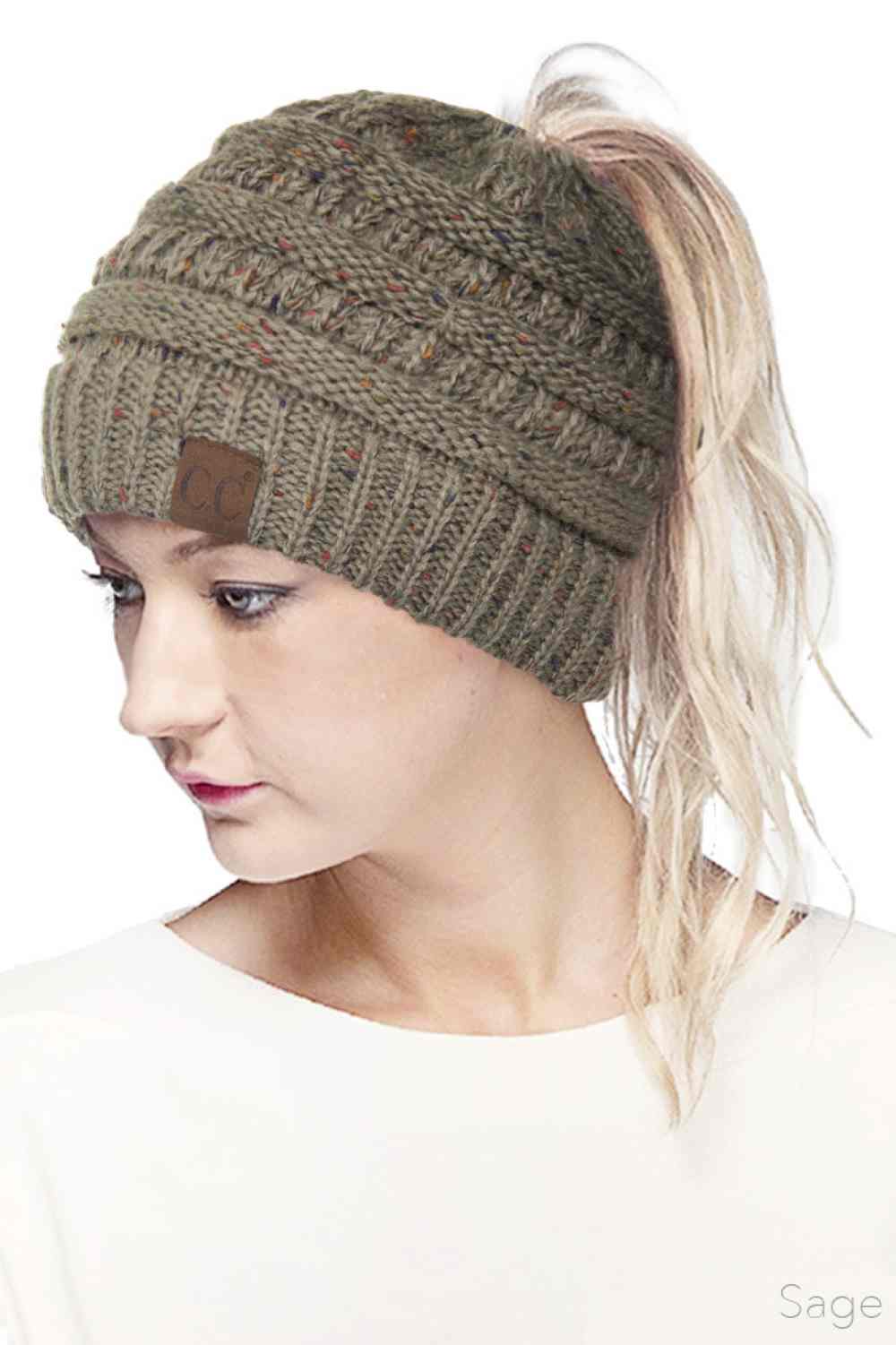 Sage Stay cozy and stylish with the C.C Ombre Confetti Messy Bun Ponytail Beanie. Crafted from 100% acrylic, this versatile beanie features a trendy messy bun opening that lets you wear your hair down while staying warm. The soft, stretchy fabric provides all-day comfort and durability, making it perfect for casual outings or outdoor adventures.&nbsp;