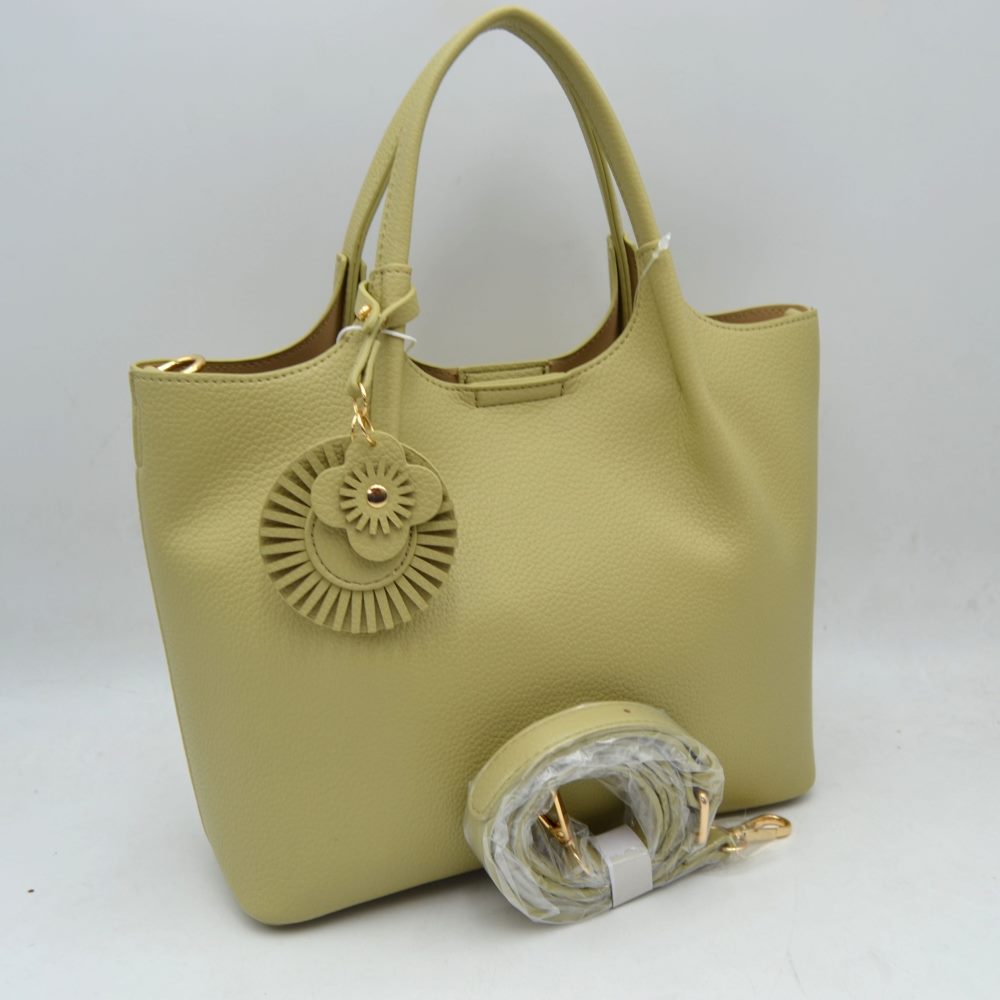 Sage Green Elevate your everyday style with this versatile and sophisticated&nbsp;pebbled tote. Designed for the modern woman who values both form and function, this bag seamlessly transitions from a professional office setting to a casual weekend outing.