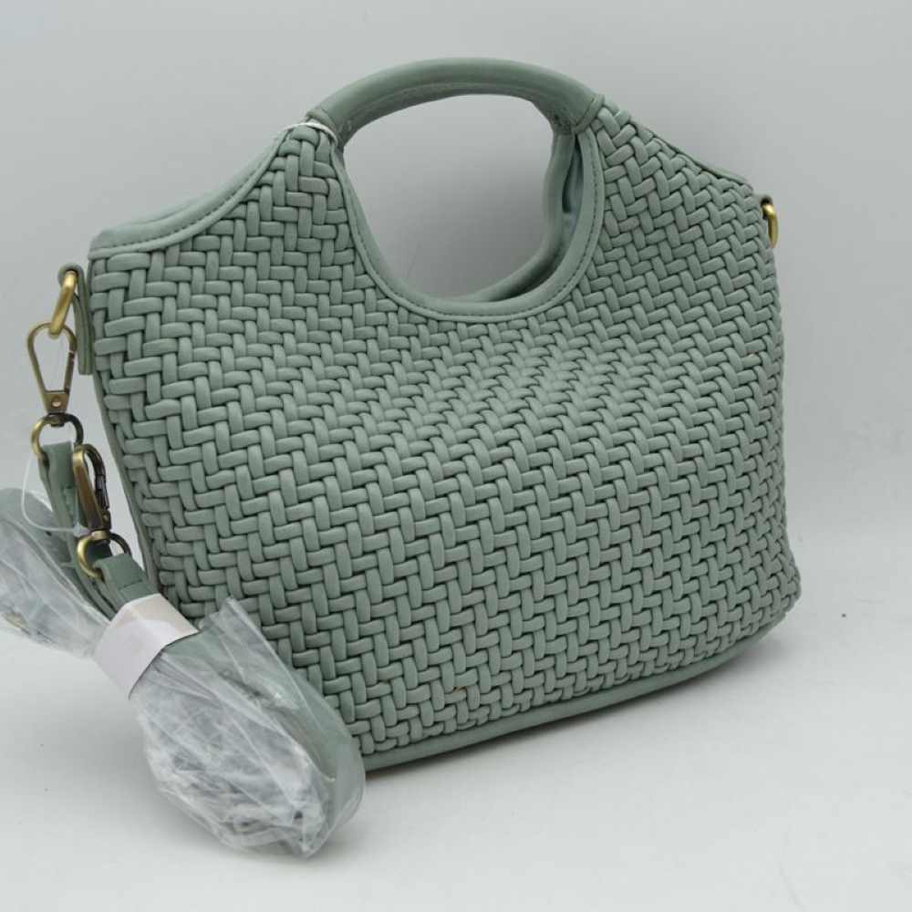Sage Step up your style game with this stunning woven satchel. Combining structural luxury with a rich, tactile finish, this handbag showcases an intricate basket-weave design that mimics classic Italian artisan craftsmanship. Perfect for making a statement at work, evening dinners, or casual weekend outings, its unique silhouette serves as the ultimate transitional accessory.
