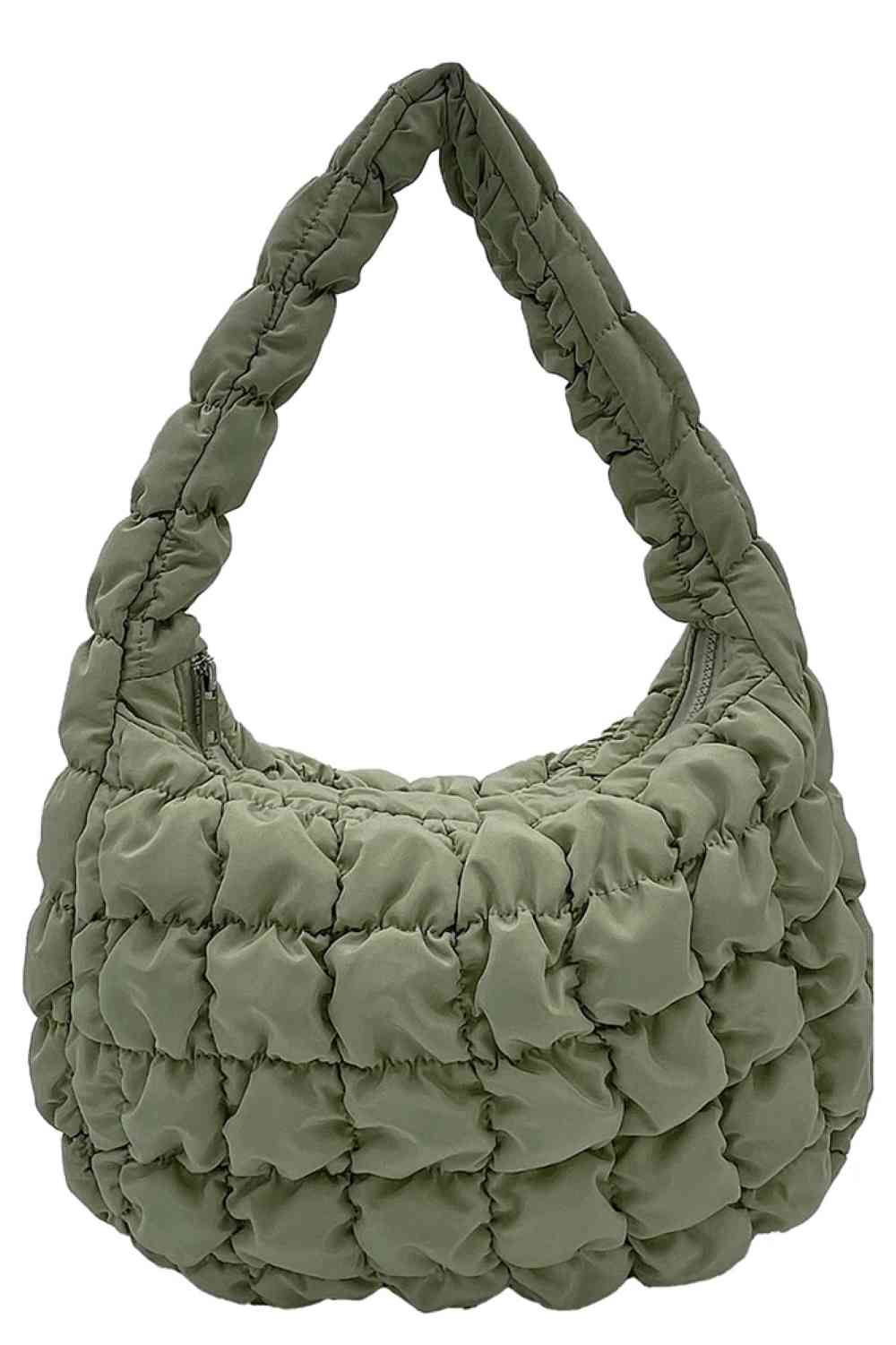 Sage Compact quilted bag crafted from durable 100% polyester with a timeless solid design. Measuring 8.7" x 11.8" x 3.15", it's the perfect size for everyday essentials, travel accessories, or as a versatile organizer. The quilted texture adds visual interest and subtle structure. Ideal for on-the-go convenience with a sleek, minimalist aesthetic that pairs effortlessly with any outfit.