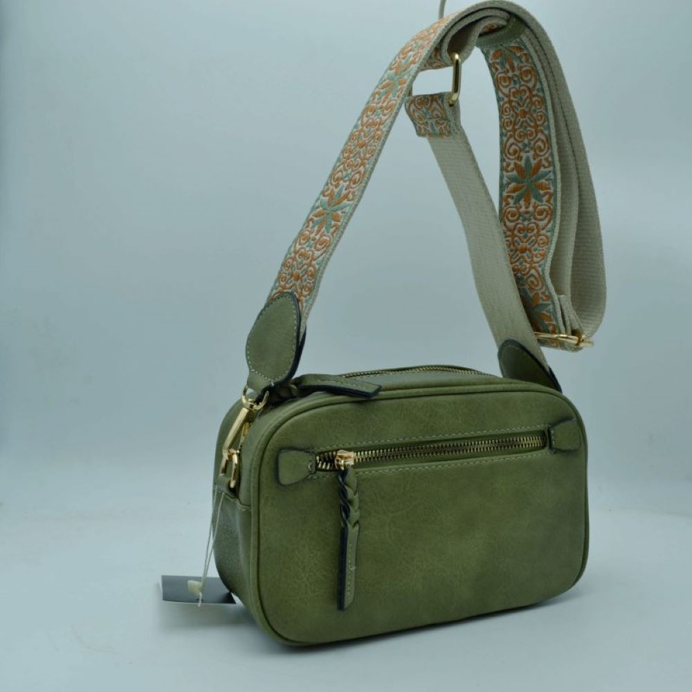 Sage Green Meet your new daily go-to accessory. The Patterned Strap Camera Bag seamlessly blends classic, structured utility with a vibrant bohemian edge. Lightweight yet spacious, this crossbody bag is designed to keep your hands free and your essentials beautifully organized whether you are traveling, commuting, or heading out for the weekend.