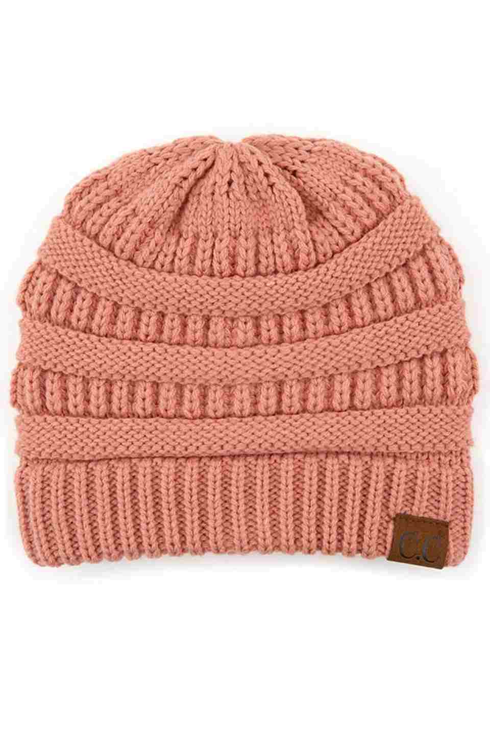 SalmonPink C.C Ribbed Knit Solid Color Beanie offers a timeless design with durable ribbed knitting, ensuring a snug and comfortable fit. Crafted for warmth and versatility, this beanie is perfect for everyday wear, providing reliable protection against cold weather while maintaining a sleek, minimalist style that complements any outfit. Its solid color adds understated appeal, making it an essential accessory for both casual and outdoor use.  