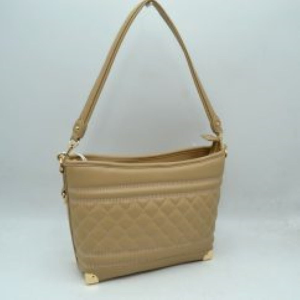 Sand This everyday shoulder bag features a structured silhouette highlighted by a quilted diamond pattern across the lower midsection and horizontal stitched ridges. Designed for practical daily use, it is equipped with a single flat shoulder strap secured to the sides by hardware attachments.