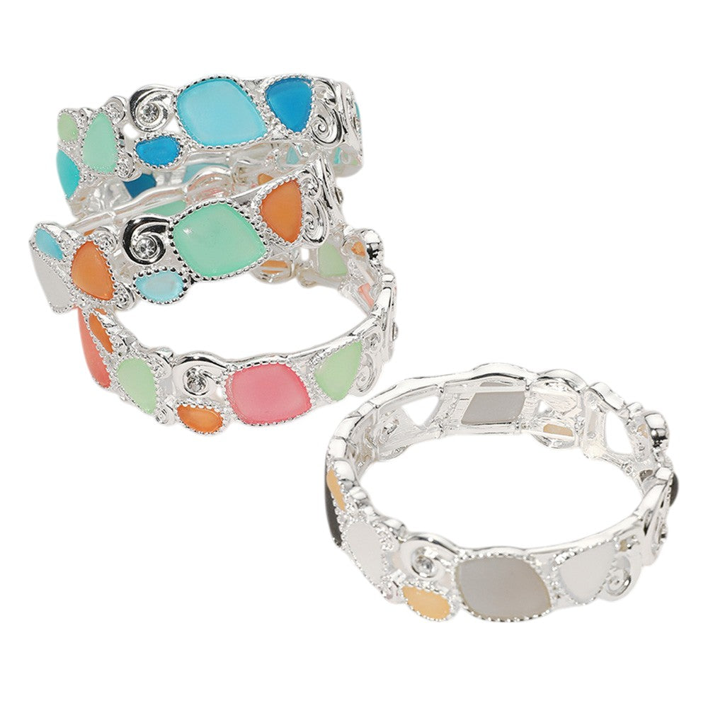 Sea Glass Pebble Stretch Bracelet is expertly crafted with genuine sea glass pebbles for a unique and natural look. The stretch design ensures a comfortable and secure fit. Elevate your style with this one-of-a-kind piece of jewelry.