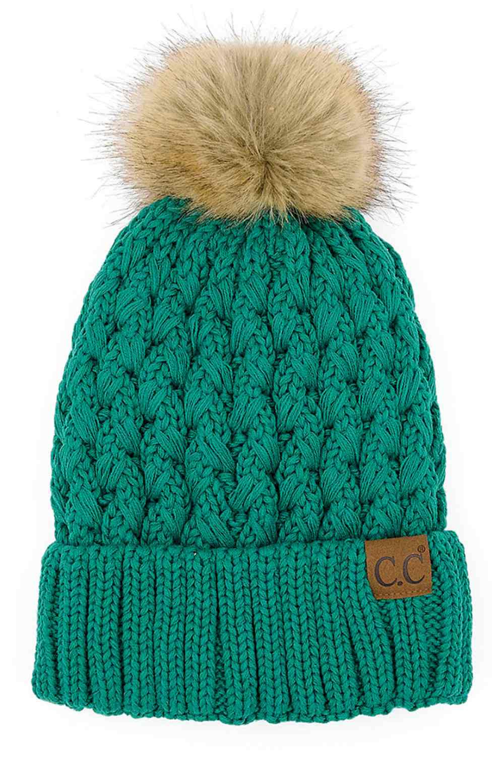 Seagreen Elevate your winter wardrobe with the C.C Lattice Crossover Stitch Beanie, featuring an intricate lattice pattern and cozy pom detail. Crafted from 100% soft acrylic, this beanie delivers warmth and comfort without the weight. The crossover stitch design adds visual interest while the relaxed fit suits most face shapes. Perfect for layering over your favorite winter looks, this versatile beanie transitions effortlessly from casual outings to outdoor adventures. One size fits most for easy, everyday