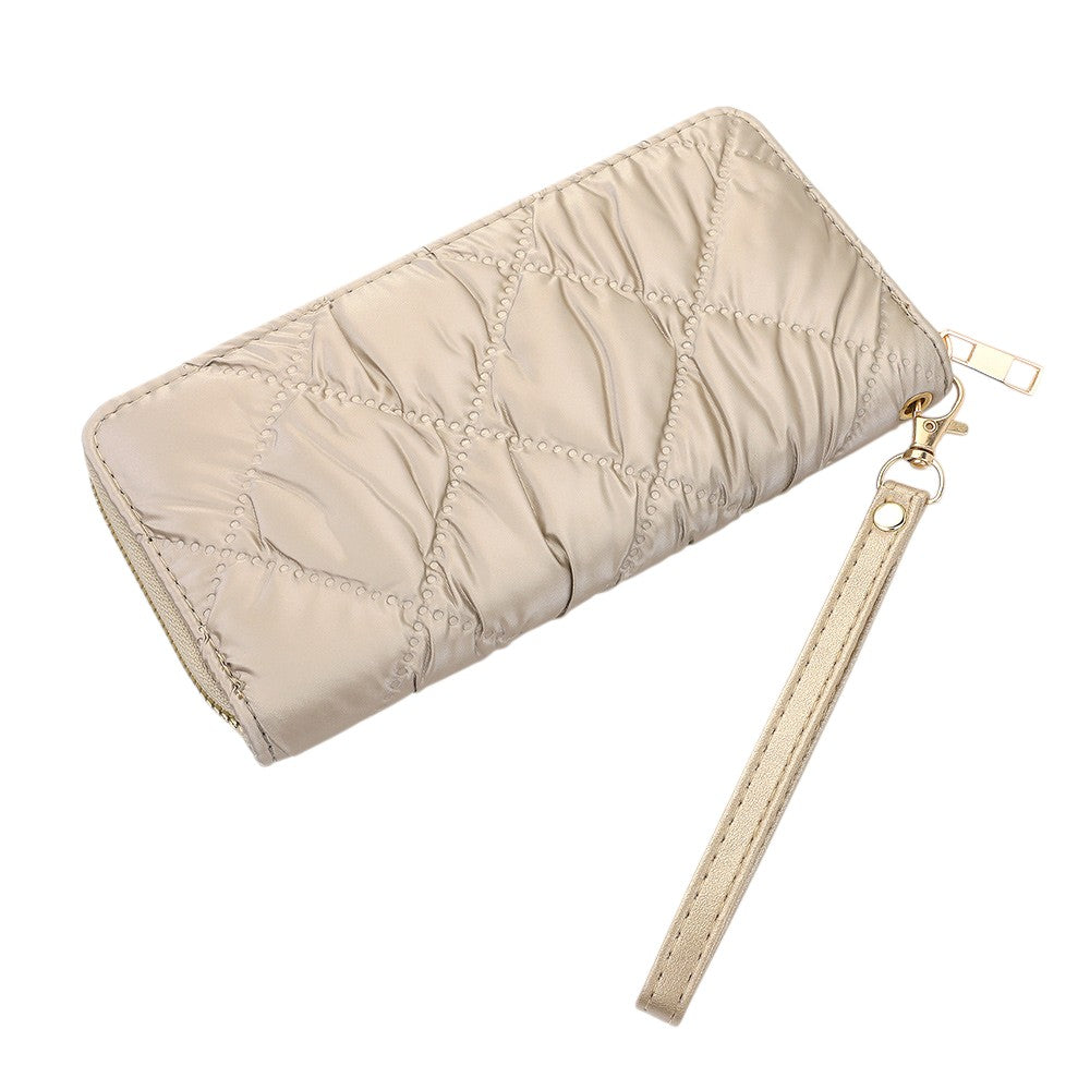 Shiny Faux Leather Padded Wallet with Wristlet offers a sleek and stylish solution for storing your essentials. Its shiny faux leather material adds a touch of sophistication, while the padded design keeps your valuables safe. The attached wristlet also provides convenience and hands-free carrying. 