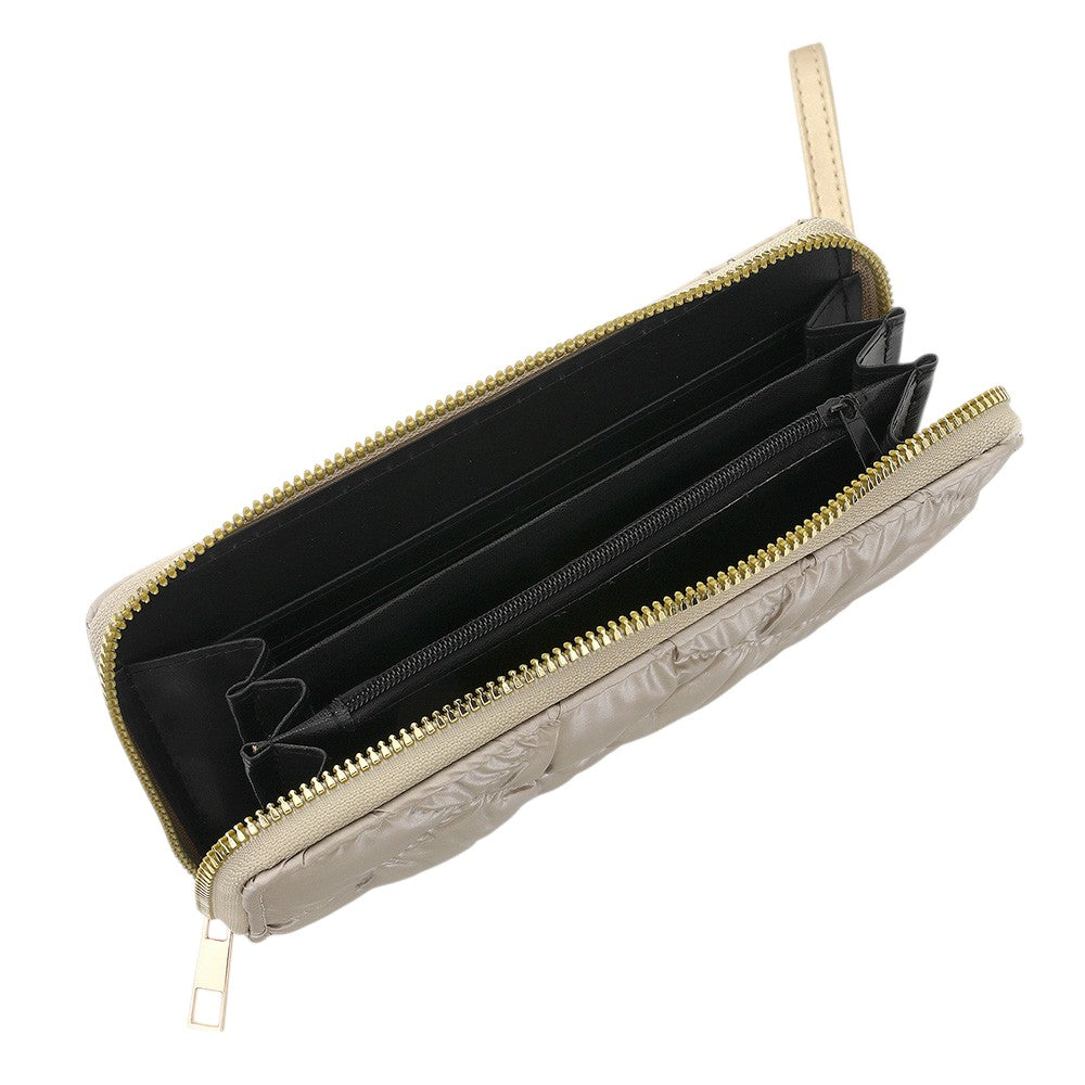 Shiny Faux Leather Padded Wallet with Wristlet offers a sleek and stylish solution for storing your essentials. Its shiny faux leather material adds a touch of sophistication, while the padded design keeps your valuables safe. The attached wristlet also provides convenience and hands-free carrying. 