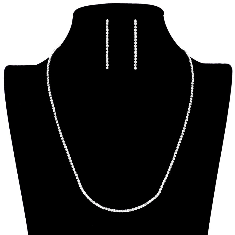 Silver Basic Rhinestone Necklace, exudes timeless elegance, crafted from gleaming rhinestones. Its classic design will forever remain in style, making it an ideal accessory for a variety of occasions. This unique set is a great way to add a touch of glamour and sophistication to any outfit. Perfect for any special occasion.