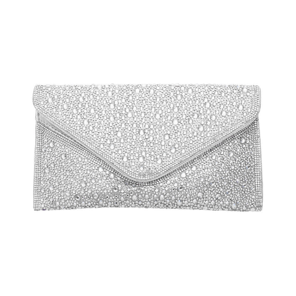 Silver Bling Stone Studded Clutch Bag doubles as a crossbody bag as well, making it a versatile and stylish choice for any evening occasion. The bling stones add a touch of glamour, while the flap envelope design keeps your belongings secure. Perfect for a night out, this bag will elevate any outfit.