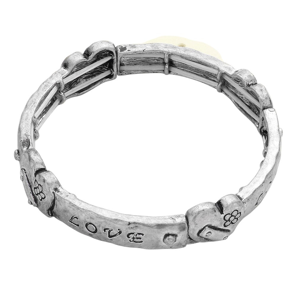 Silver Love Message Stretch Bracelet is a must-have accessory for anyone looking to express their love and affection. The stretch design allows for a comfortable fit, while the bracelet features a beautiful love message that is sure to warm the heart of the recipient. Made with high-quality materials, this bracelet is a meaningful gift that will last for years to come