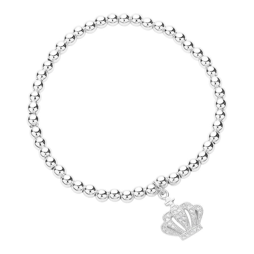 Silver CZ Stone Paved Crown Charm Bracelet is made of durable stainless steel and features sparkling cubic zirconia stones. The stretch design allows for a comfortable fit for any wrist size. Enhance any outfit with this stylish and sophisticated accessory.