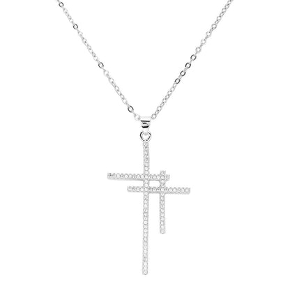 Silver CZ Stone Paved Double Cross Pendant Stainless Steel Necklace is a perfect blend of style and durability. Crafted with high-quality stainless steel and adorned with sparkling CZ stones, this necklace exudes elegance. The double cross pendant design adds a unique touch, making it a versatile accessory for any outfit.