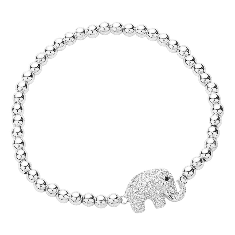 Silver CZ stone paved elephant stainless steel ball stretch bracelet combines style and durability. Crafted with high-quality stainless steel, this bracelet features intricate CZ stone detailing and a stretch design for a comfortable and secure fit. Elevate any outfit with this unique and eye-catching piece.