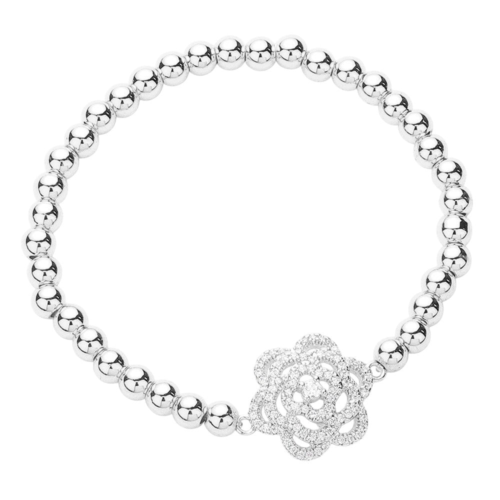 Silver CZ Stone Paved Flower-Pointed Stainless Steel Ball Stretch Bracelet is perfect for adding a touch of elegance to any outfit. The beautiful flower design is adorned with sparkling cubic zirconia stones, making it a must-have accessory for any fashion-forward individual. The stainless steel construction ensures durability, and the stretch design provides a comfortable fit. Elevate your style with this stunning bracelet.