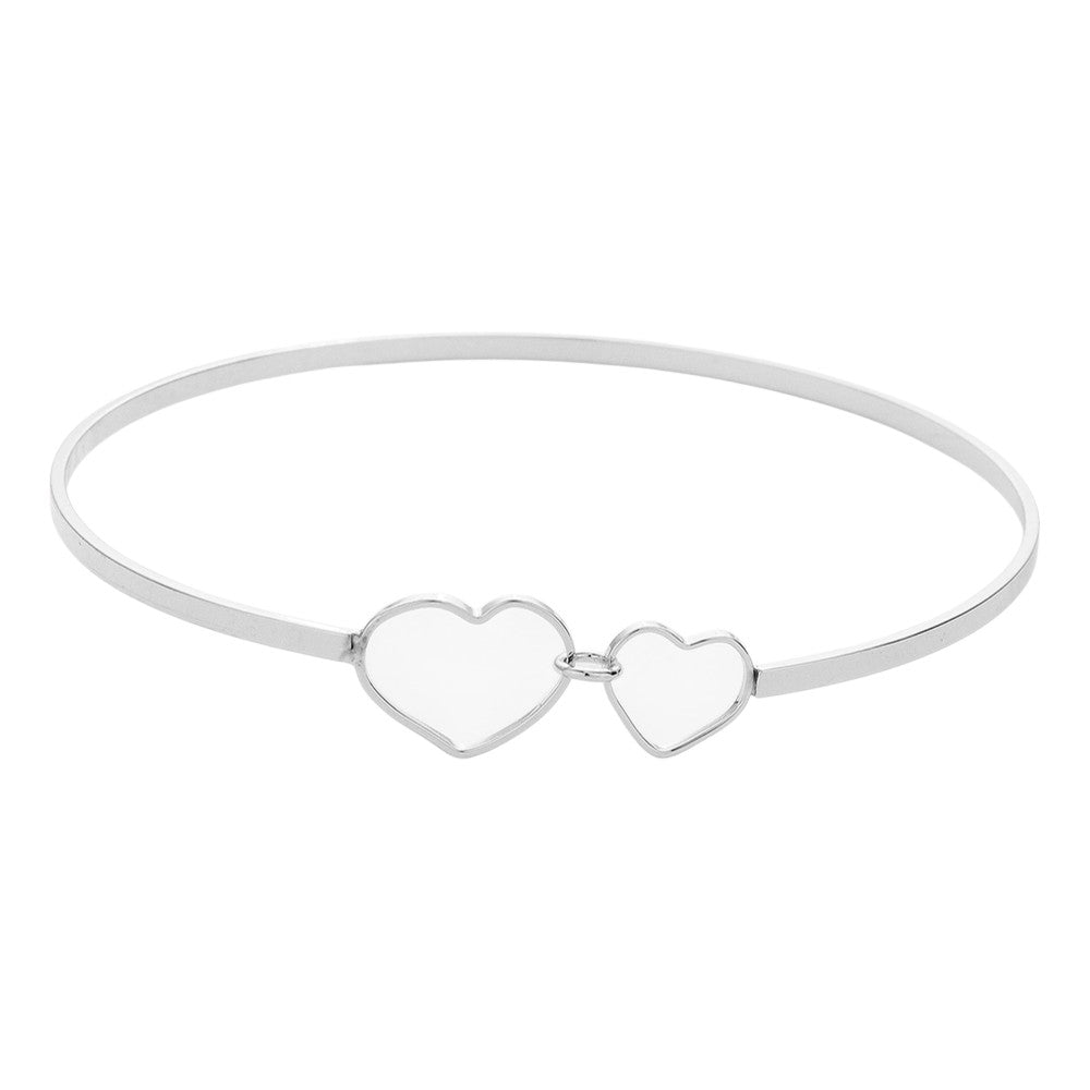 Silver Double Open Metal Heart Link Bangle Bracelet features a unique design that will add a touch of sophistication to any outfit. Made with high-quality metal, it is durable and comfortable to wear. The double open heart link adds a romantic touch, making it the perfect accessory for a date night or special occasion.