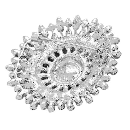 Silver Glass Crystal Bubble Pin Brooch adds a touch of elegance to any outfit. Made with high-quality glass crystals, this pin brooch sparkles and shines in the light. The circular design creates a modern and stylish look, perfect for a formal event or everyday wear. 