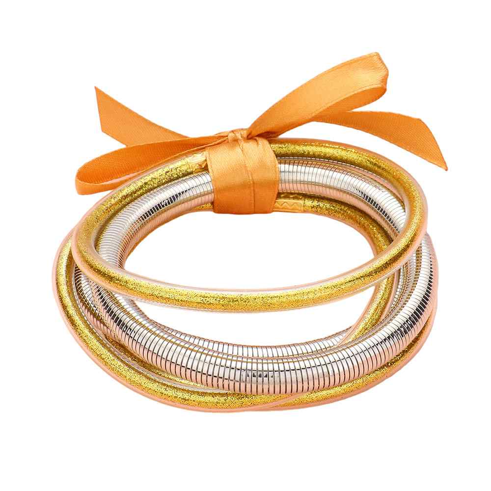 Silver Gold 5PCS Glitter Jelly Tube Metal Elastic Layered Bracelets made with high-quality materials. The elastic design ensures a comfortable fit for all wrist sizes. 