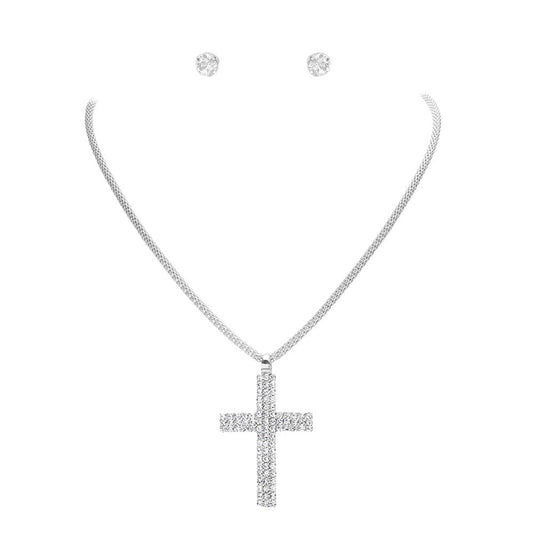 Silver Rhinestone Paved Cross Pendant Jewelry Set is exquisitely crafted from premium-grade metal alloy for a lasting shine. Its intricate design is adorned with shimmering rhinestones for an elegant look. The set includes a matching necklace and earrings. Perfect gift for religious friends and family members.