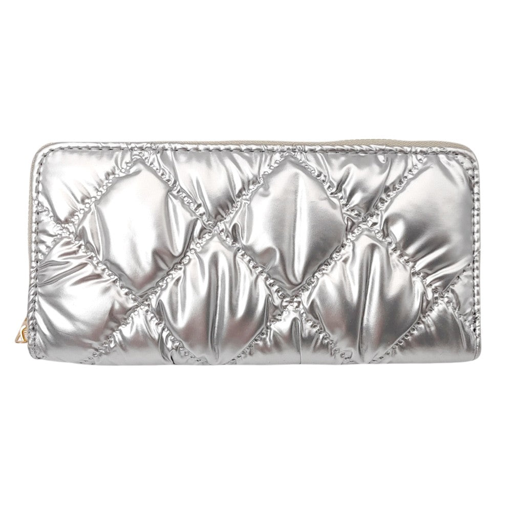 Silver Shiny Faux Leather Padded Wallet with Wristlet offers a sleek and stylish solution for storing your essentials. Its shiny faux leather material adds a touch of sophistication, while the padded design keeps your valuables safe. The attached wristlet also provides convenience and hands-free carrying. 