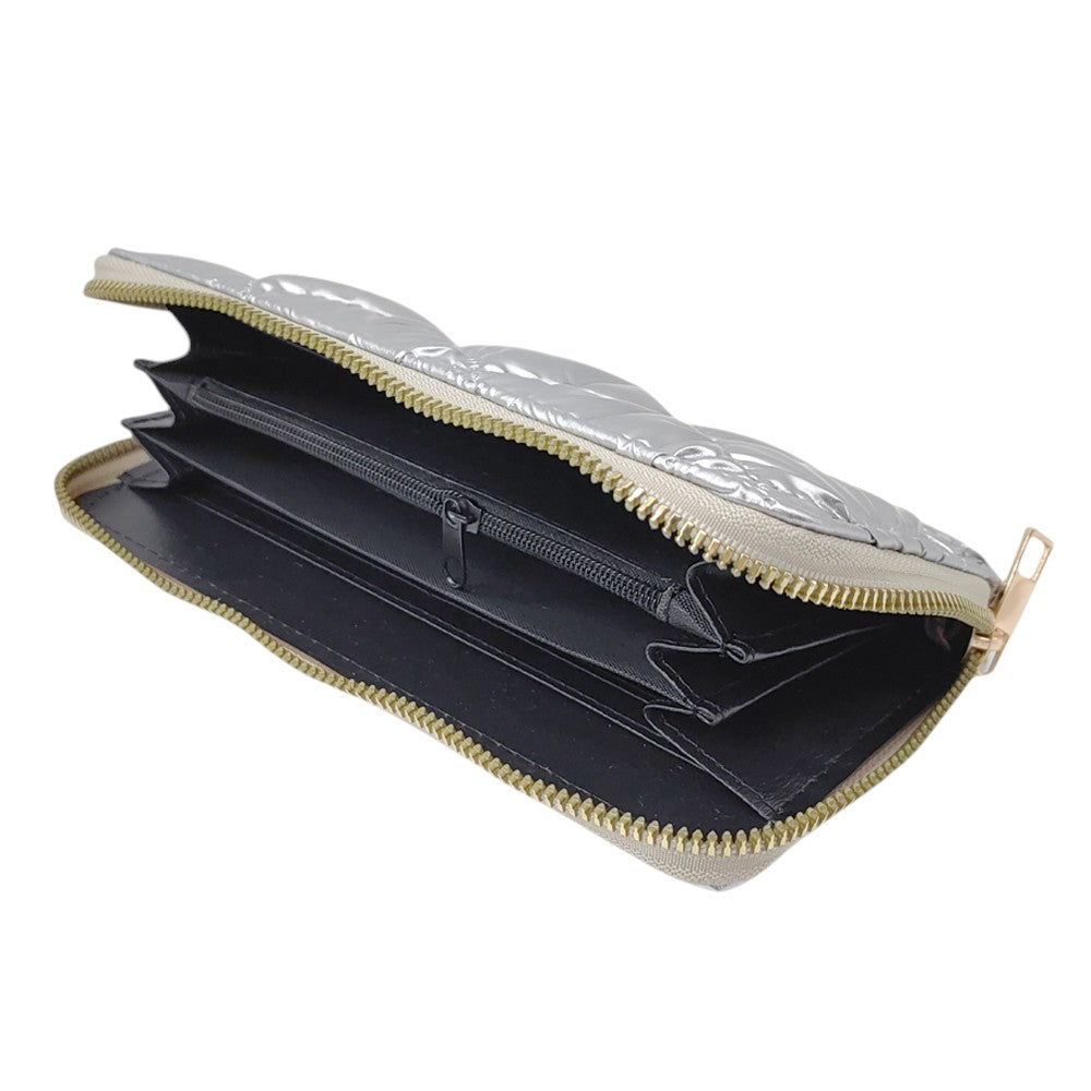 Silver Shiny Faux Leather Padded Wallet with Wristlet offers a sleek and stylish solution for storing your essentials. Its shiny faux leather material adds a touch of sophistication, while the padded design keeps your valuables safe. The attached wristlet also provides convenience and hands-free carrying. 