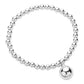 Silver Stainless Steel Ball Charm Pointed Stretch Bracelet is a stylish and versatile accessory. Made of durable stainless steel, it features an eye-catching ball charm and a stretch design for an adjustable fit. Perfect for adding a touch of elegance to any outfit.