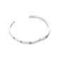 Silver Stainless Steel Crystal Embellished Bangle Evening Bracelet is a must-have accessory for any evening event. Made with durable stainless steel and adorned with dazzling crystals, this bracelet adds a touch of elegance and sophistication. Perfect for a formal dinner or a night out on the town.