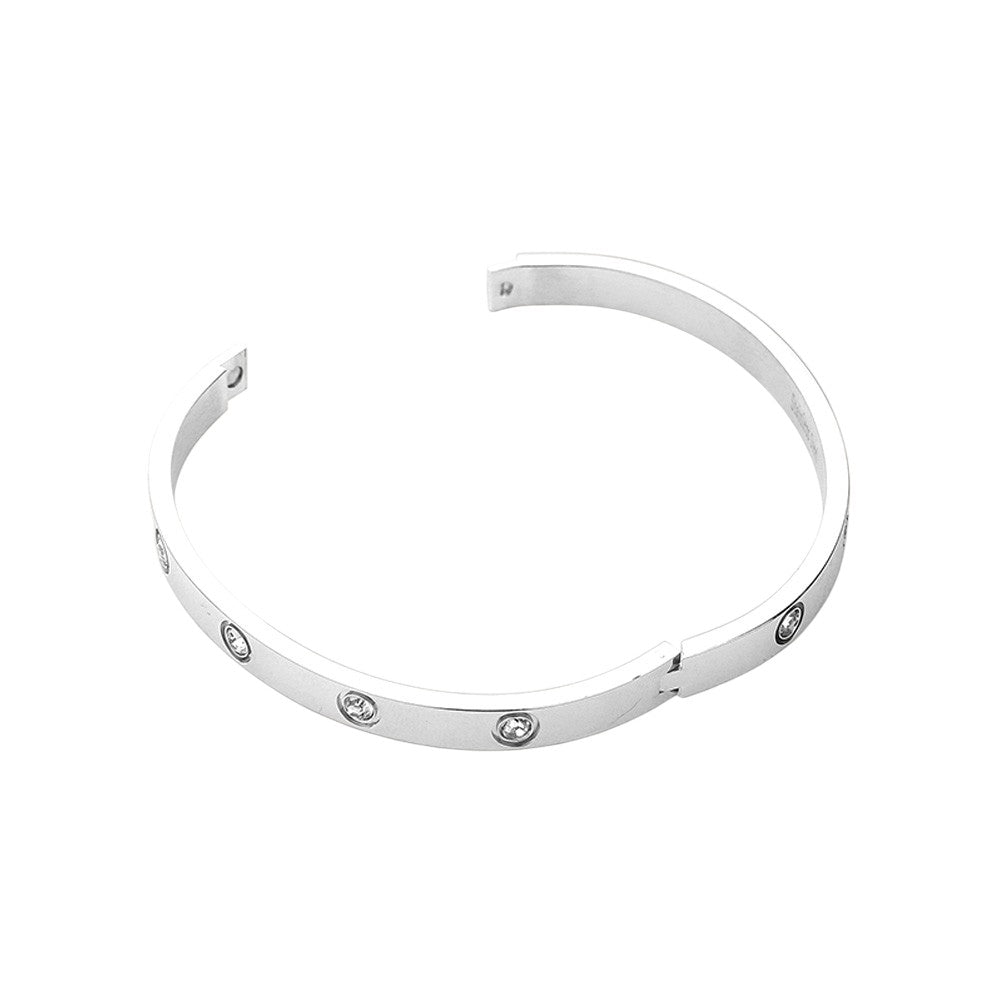 Silver Stainless Steel Crystal Embellished Bangle Evening Bracelet is a must-have accessory for any evening event. Made with durable stainless steel and adorned with dazzling crystals, this bracelet adds a touch of elegance and sophistication. Perfect for a formal dinner or a night out on the town.