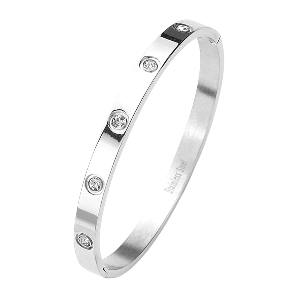 Silver Stainless Steel Crystal Embellished Bangle Evening Bracelet is a must-have accessory for any evening event. Made with durable stainless steel and adorned with dazzling crystals, this bracelet adds a touch of elegance and sophistication. Perfect for a formal dinner or a night out on the town.