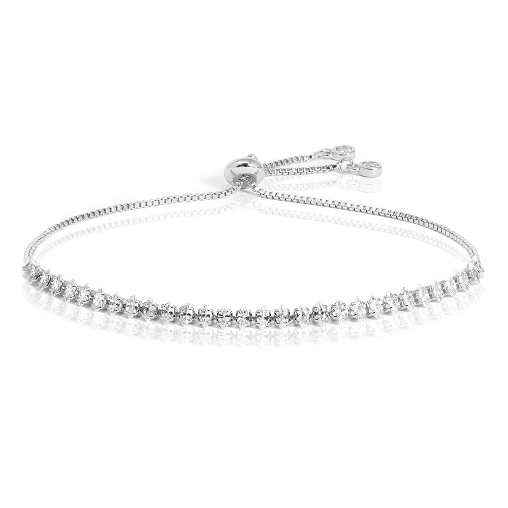 Silver Stainless Steel Marquise CZ Tennis Chain Pull Tie Adjustable Bracelet combines a modern design with durable materials. Expertly crafted with stainless steel and CZ stones, it offers comfort, versatility, and elegance. This must-have accessory adds a touch of luxury to any outfit.
