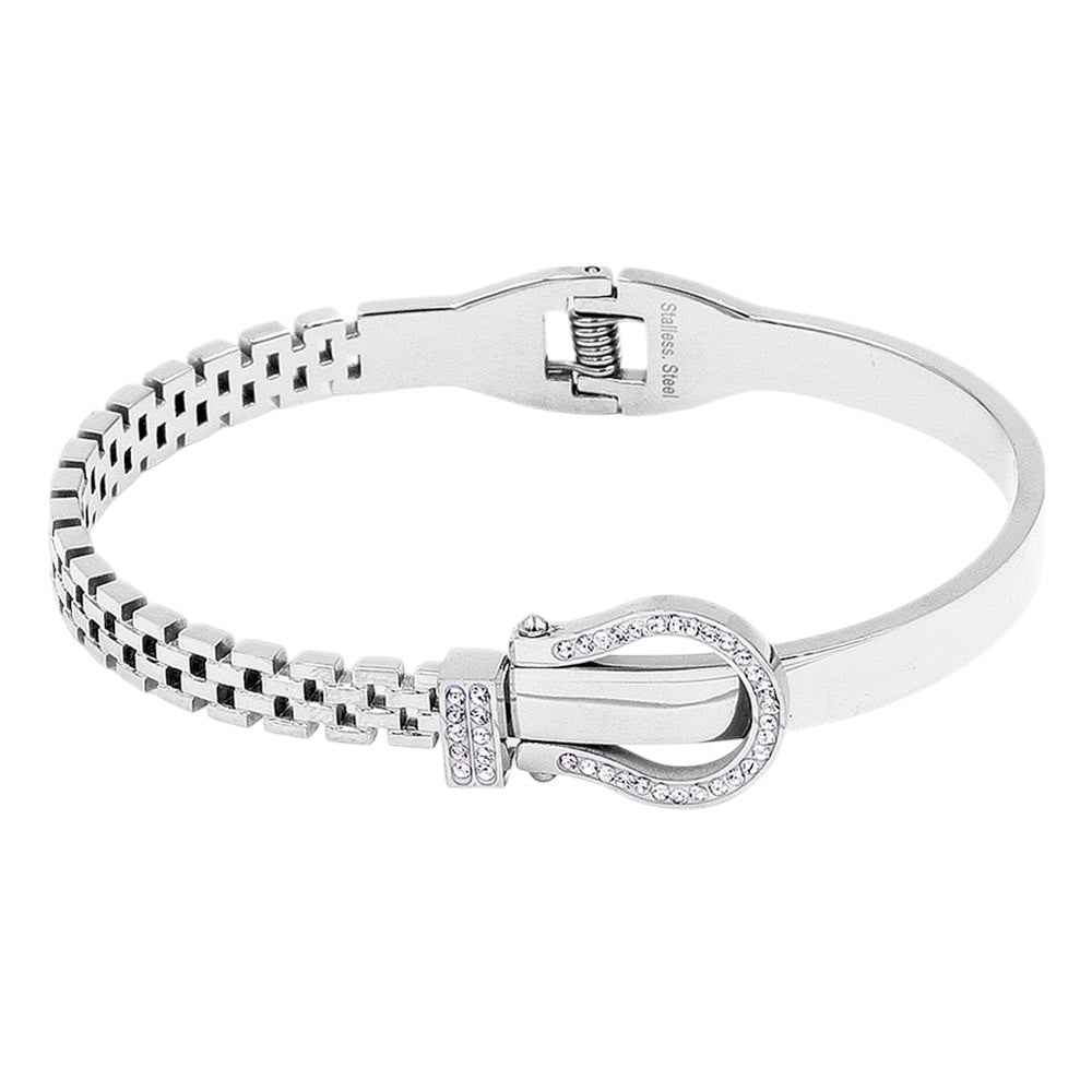 Silver Stainless steel bracelet features a stunning rhinestone belt buckle design with a hinged closure for a secure fit. Crafted with durable materials, this stylish accessory is perfect for adding a touch of elegance to any outfit. The perfect blend of fashion and function.
