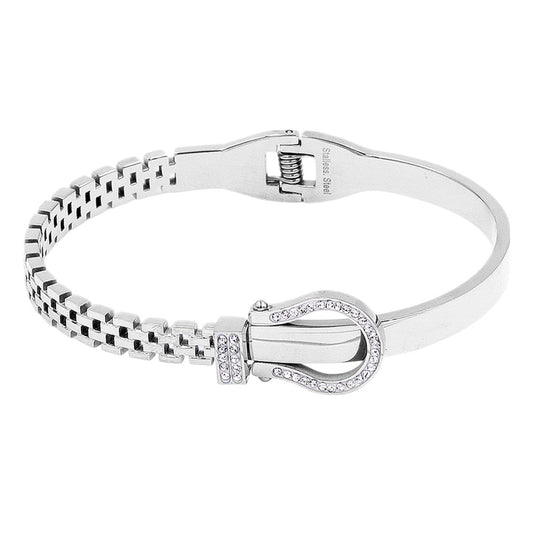 Silver Stainless steel bracelet features a stunning rhinestone belt buckle design with a hinged closure for a secure fit. Crafted with durable materials, this stylish accessory is perfect for adding a touch of elegance to any outfit. The perfect blend of fashion and function.