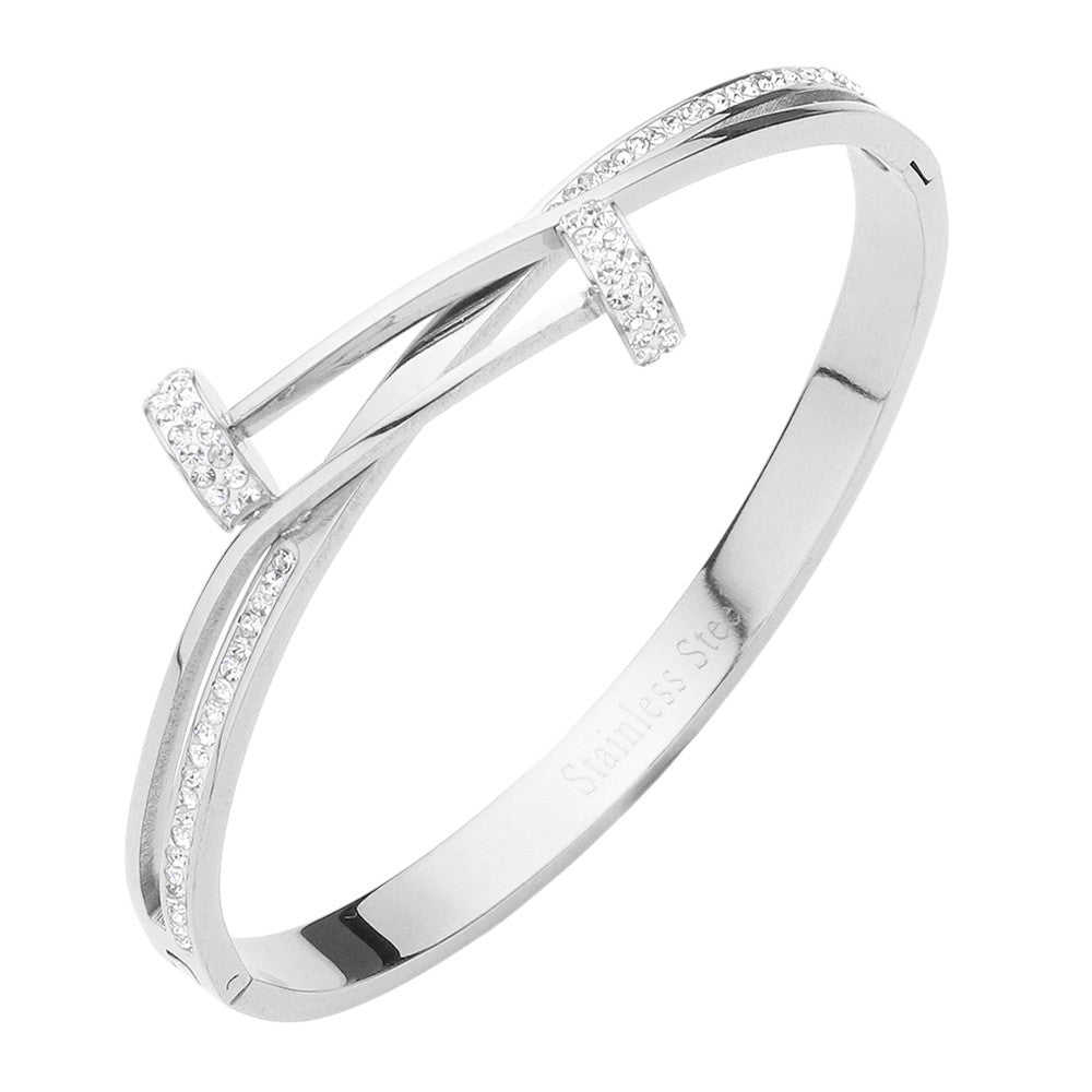 Silver Stainless Steel Stone Paved Nail Head Pointed Hinged Bracelet is a sleek and stylish accessory perfect for any occasion. Made of durable stainless steel and adorned with stones, this bracelet adds a touch of elegance to any outfit. Its pointed hinged design allows for a comfortable and secure fit. Upgrade your look with this modern and sophisticated bracelet.