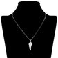 Silver Stainless Steel Stone Paved Wing Pendant Necklace is a unique and stylish piece of jewelry that is perfect for any occasion. Made with high-quality stainless steel, it is durable and resistant to tarnishing. The intricate pave design adds a touch of elegance, making it a perfect addition to any outfit. Elevate your style with this eye-catching necklace.