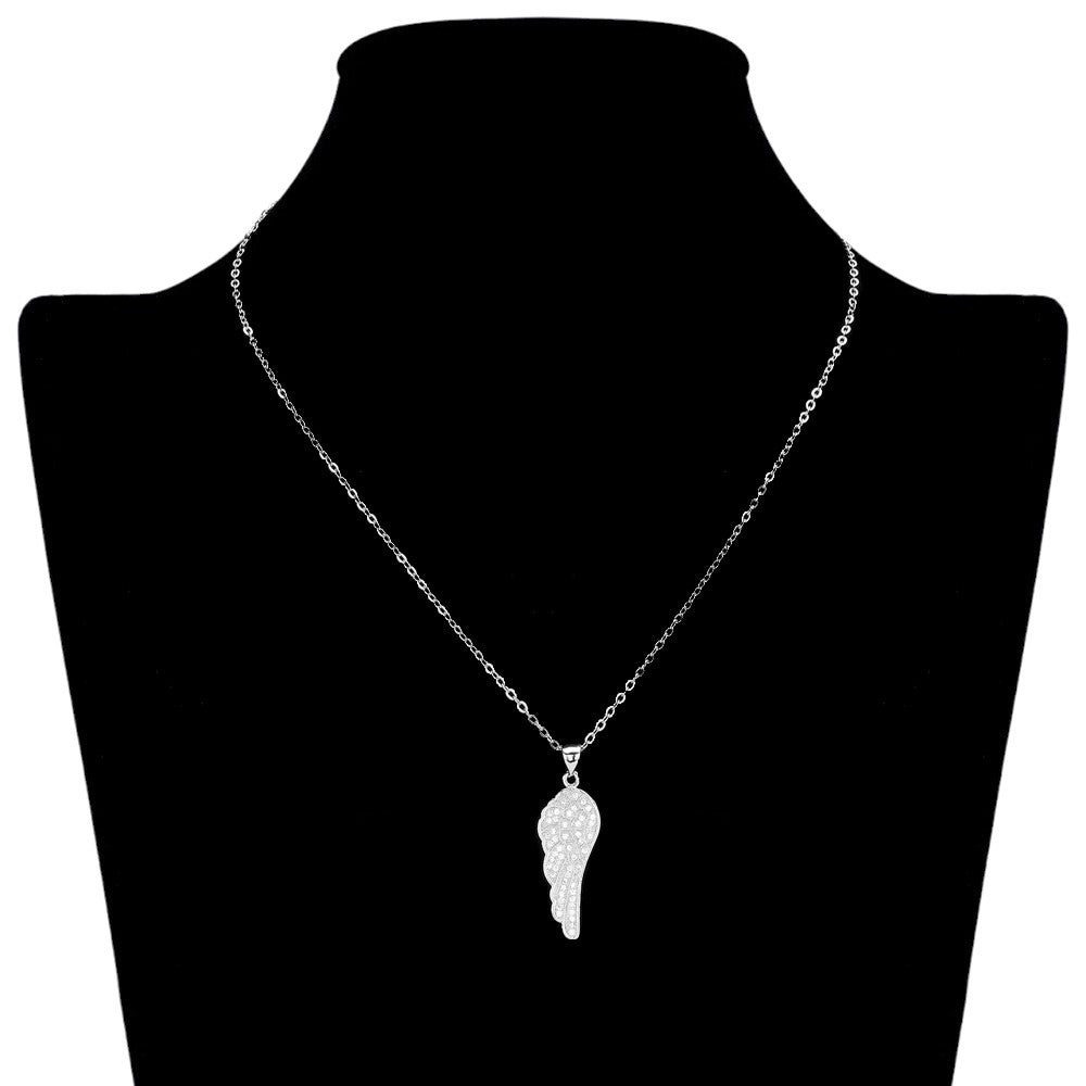 Silver Stainless Steel Stone Paved Wing Pendant Necklace is a unique and stylish piece of jewelry that is perfect for any occasion. Made with high-quality stainless steel, it is durable and resistant to tarnishing. The intricate pave design adds a touch of elegance, making it a perfect addition to any outfit. Elevate your style with this eye-catching necklace.