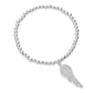 Silver Stone Paved Wing Charm Stainless Steel Beaded Stretch Bracelet is a stylish and durable accessory. The stones add a touch of elegance, while the stainless steel beads provide durability and a sleek look. The stretch feature allows for a comfortable and easy fit. Elevate any outfit with this versatile and high-quality bracelet.