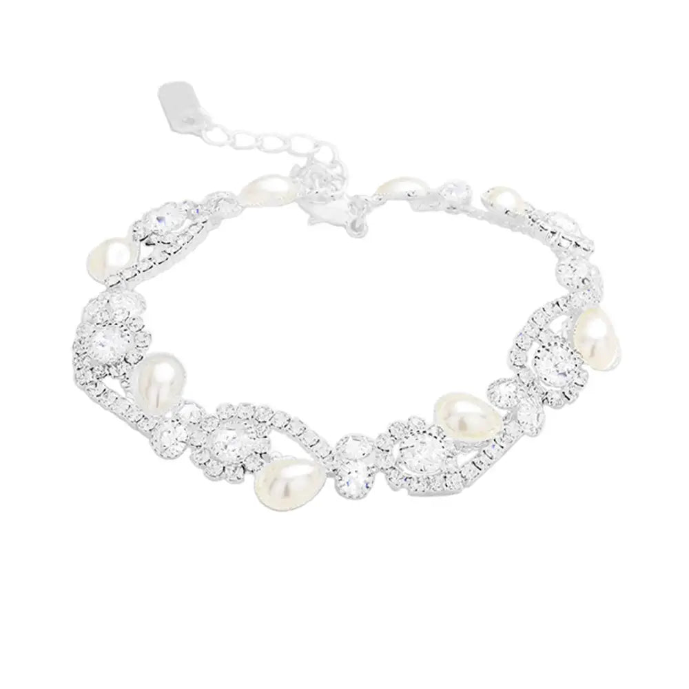 Silver Teardrop Pearl Detail Rhinestone Pave Floral Evening Bracelet, put on a pop of color to complete your ensemble. Perfect for adding just the right amount of shimmer & shine and a touch of class to special events. Perfect Birthday Gift, Anniversary Gift, Mother's Day Gift, Graduation Gift, Valentine’s Gift.