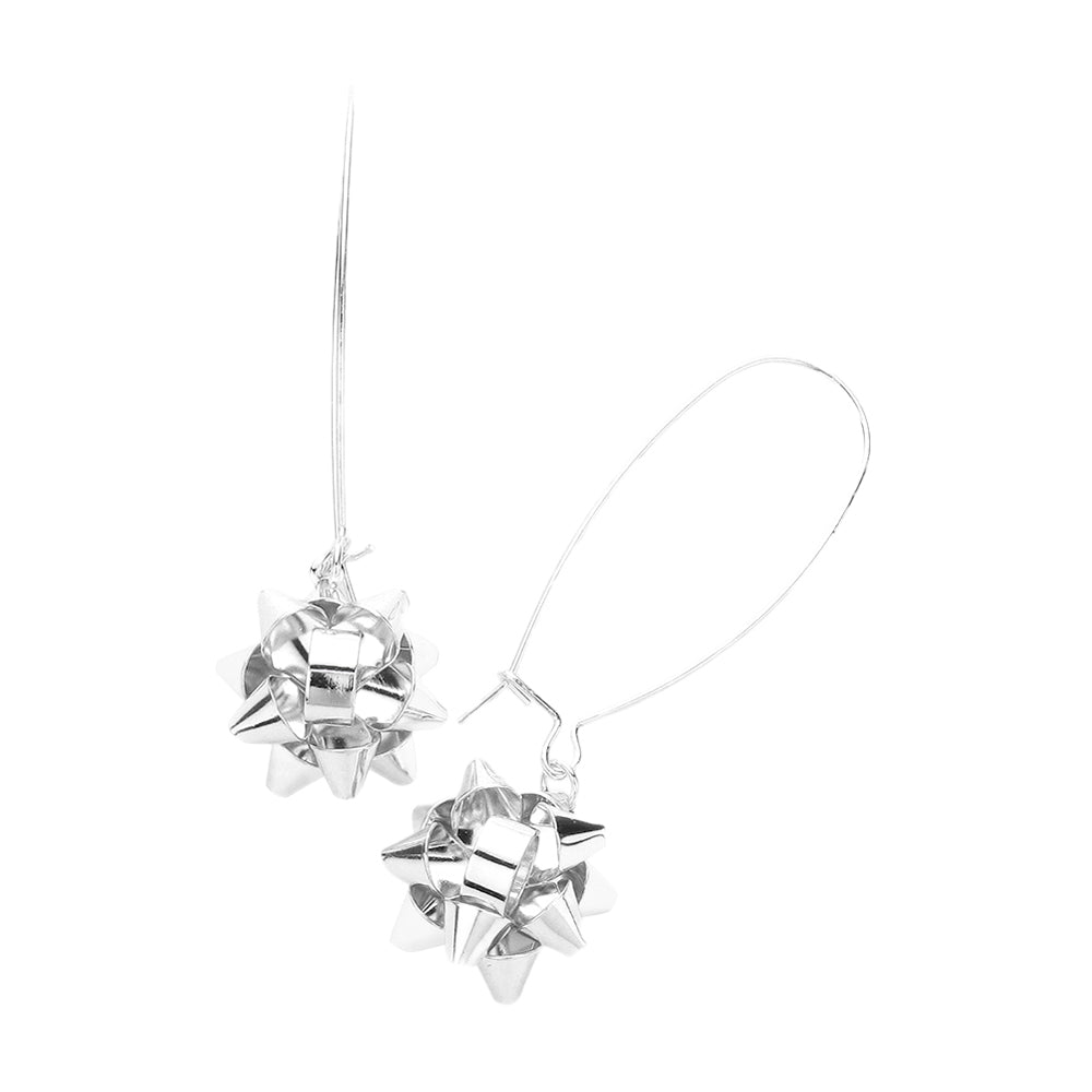 Silver Trendy Christmas Gift Bow Dangle Earrings, are beautifully designed with a bow theme that will make a glowing touch on everyone. These beautiful earrings are the ultimate representation of your class & beauty. These are the perfect gift for Christmas, especially for your friends, family, and the persons you love.