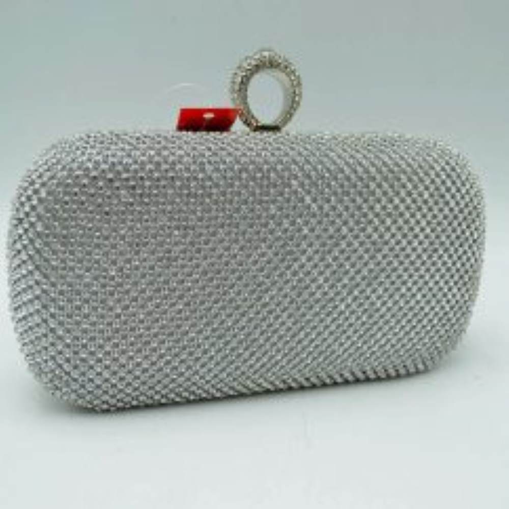 Silver This hard-case box clutch features a fully embellished grid pattern of shimmering studs, offering an eye-catching accent suitable for elevated everyday use or special occasions. The rigid, rounded silhouette encloses a main storage compartment designed to keep essentials secure. It is topped with a decorative, textured ring clasp that serves as both a distinct top handle element and a functional closure mechanism mechanism to open the bag.