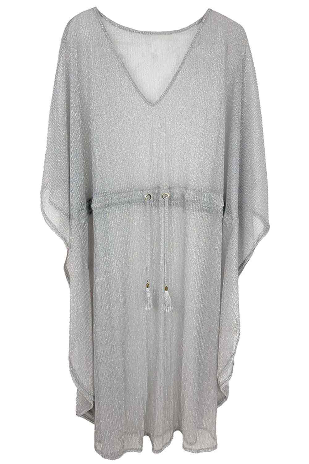 Silver Elevate your wardrobe with this shimmering Lurex String Poncho, a versatile layering piece that catches the light beautifully. Crafted from 100% polyester, this lightweight poncho measures 42" x 40", offering comfortable coverage for any occasion. The lurex threading adds a touch of glamour and sparkle, making it perfect for casual outings or dressed-up evenings. Easy to throw on over any outfit, this poncho is an effortless way to add dimension and style to your look.