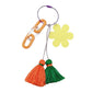 yellow Smile Flower Tassel Bag Charm/Keychain adds a touch of whimsy and charm to your bag or keys. The vibrant colors and playful design are sure to bring a smile to your face. Made with high-quality materials, this accessory is both durable and stylish.