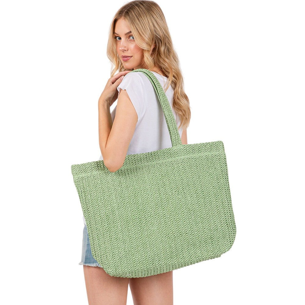 Olive Green Solid Crochet Straw Tote Bag is perfect for a day at the beach. Made from durable straw material, it features a spacious interior and sturdy handles for carrying all your essentials. Stay stylish and organized with this must-have accessory.