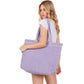 Purple Solid Crochet Straw Tote Bag is perfect for a day at the beach. Made from durable straw material, it features a spacious interior and sturdy handles for carrying all your essentials. Stay stylish and organized with this must-have accessory.