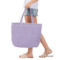 Purple Solid Crochet Straw Tote Bag is perfect for a day at the beach. Made from durable straw material, it features a spacious interior and sturdy handles for carrying all your essentials. Stay stylish and organized with this must-have accessory.