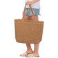 Taupe Solid Crochet Straw Tote Bag is perfect for a day at the beach. Made from durable straw material, it features a spacious interior and sturdy handles for carrying all your essentials. Stay stylish and organized with this must-have accessory.