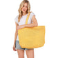 Yellow Solid Crochet Straw Tote Bag is perfect for a day at the beach. Made from durable straw material, it features a spacious interior and sturdy handles for carrying all your essentials. Stay stylish and organized with this must-have accessory.
